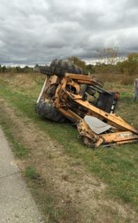 Flipped Excavator Truck — Auburn Hills, MI — General Towing Auburn Hills