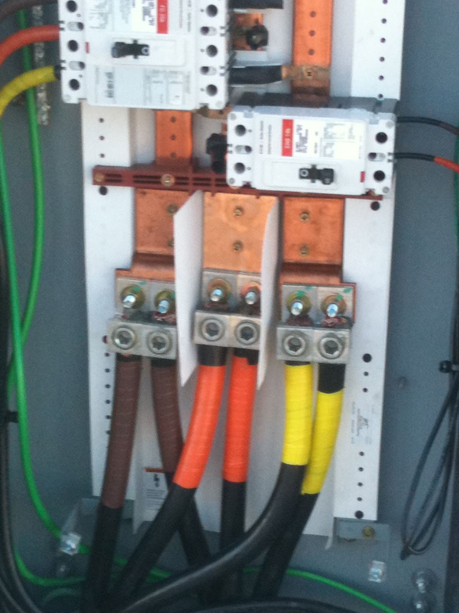 A close up of an electrical panel with a red label that says ' abb ' on it