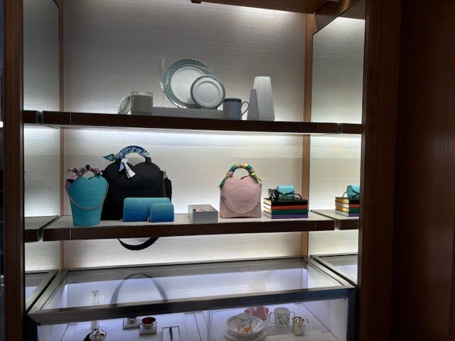 A display case with a lot of items on it