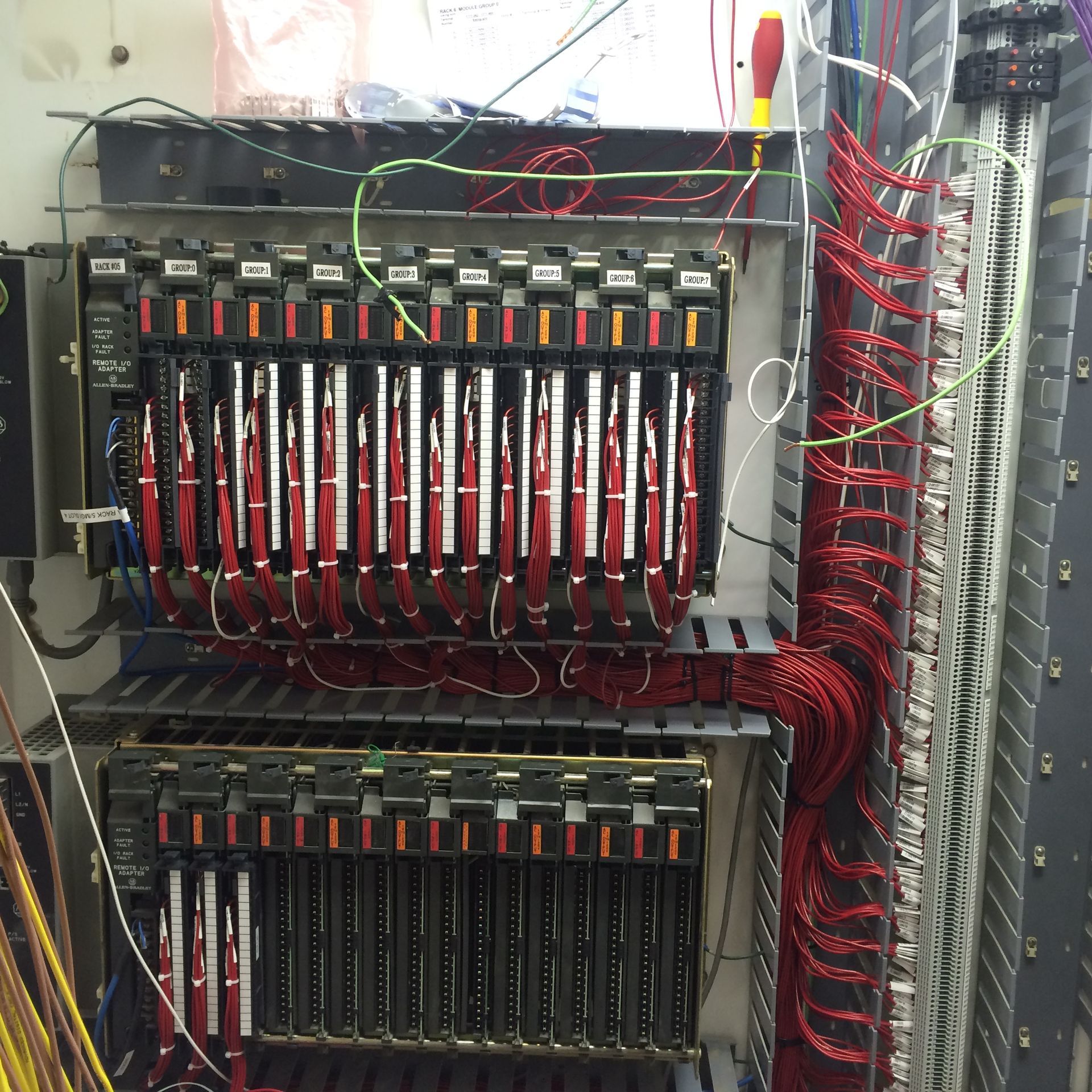 A bunch of wires are connected to a machine