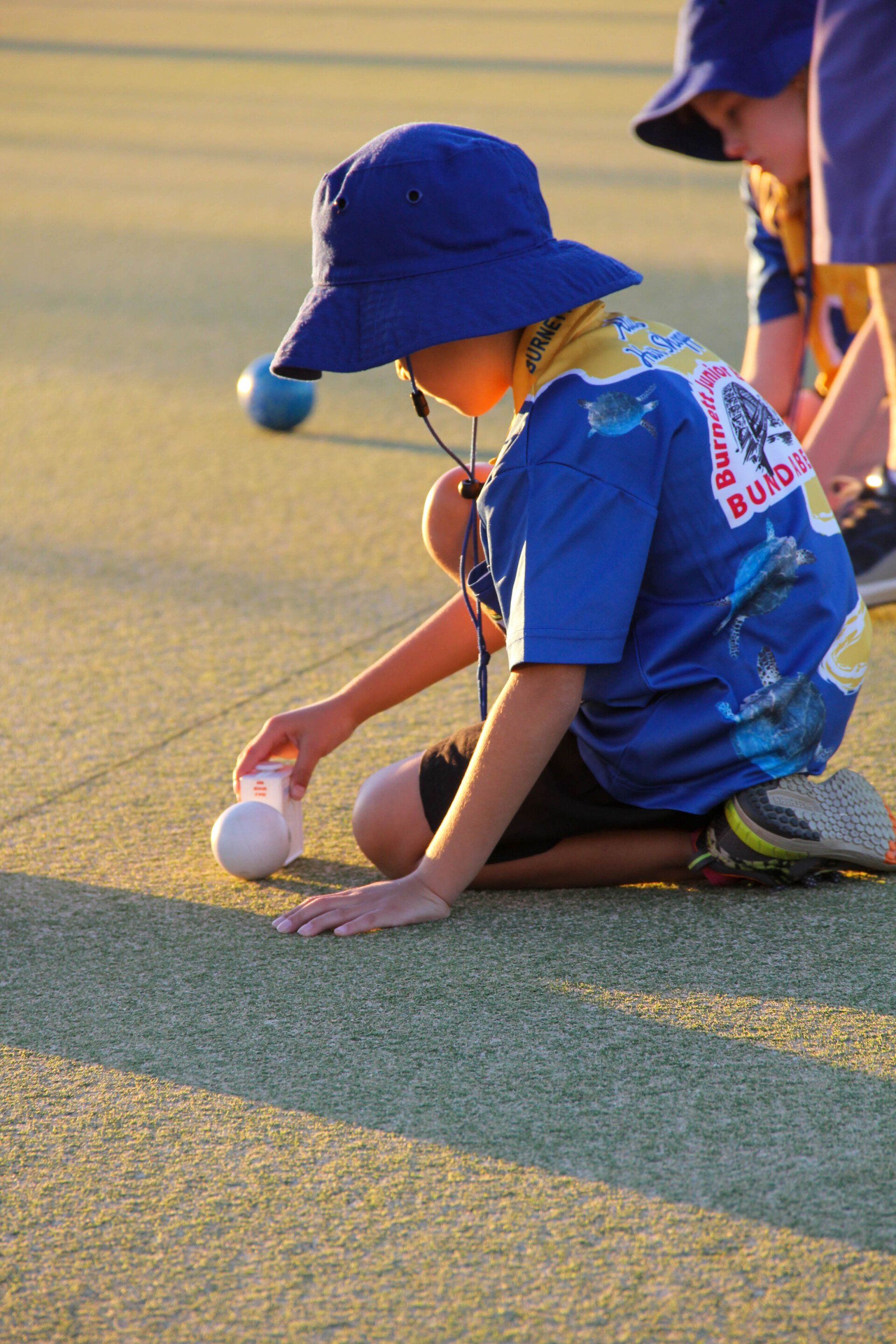 Young Boy With Bowls Ball