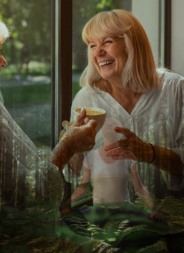 Elderly woman laughs, receiving tea. Bright sunlight, white clothing, forest overlay.
