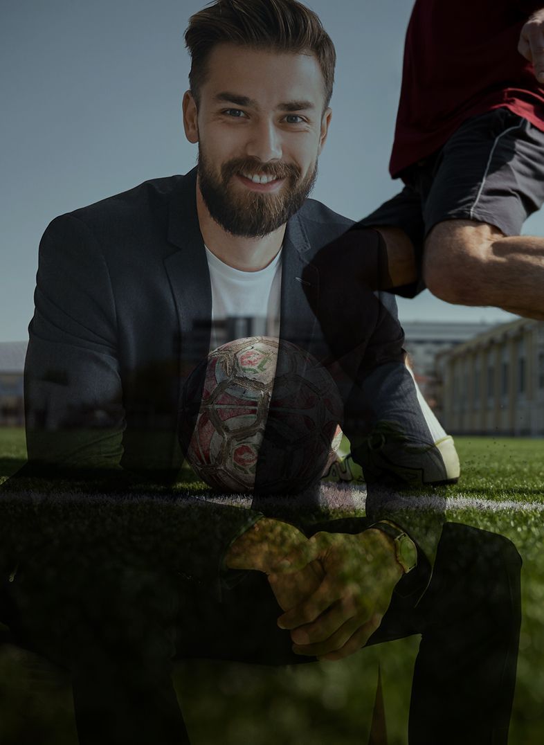 Man in a suit smiles, overlaid with a soccer player on a field.