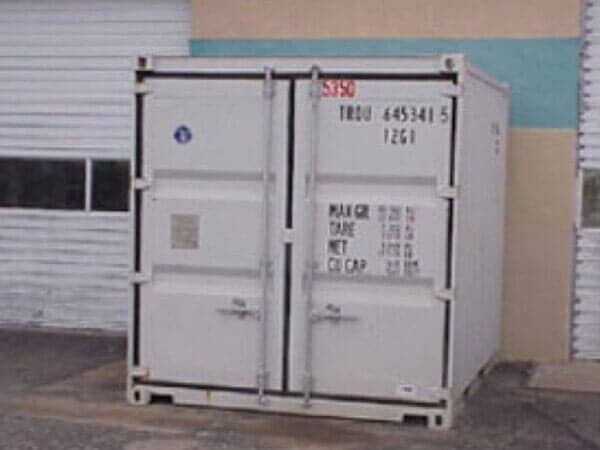 White Storage Container with Written Text - Storage Unit Homes in Albuquerque, NM