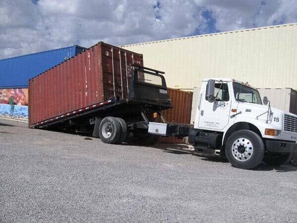 Red Storage Container Loaded on Truck - Storage Unit Homes in Albuquerque, NM
