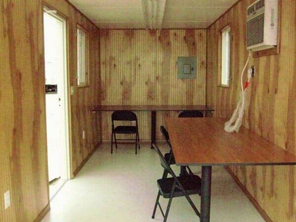 Inside of Trailer House with Wood-like Wallpaper - Storage Unit Homes in Albuquerque, NM