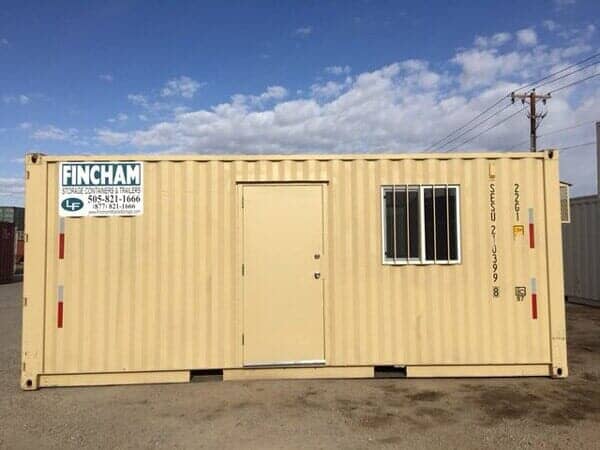 Yellow Trailer House with One Window - Storage Unit Homes in Albuquerque, NM