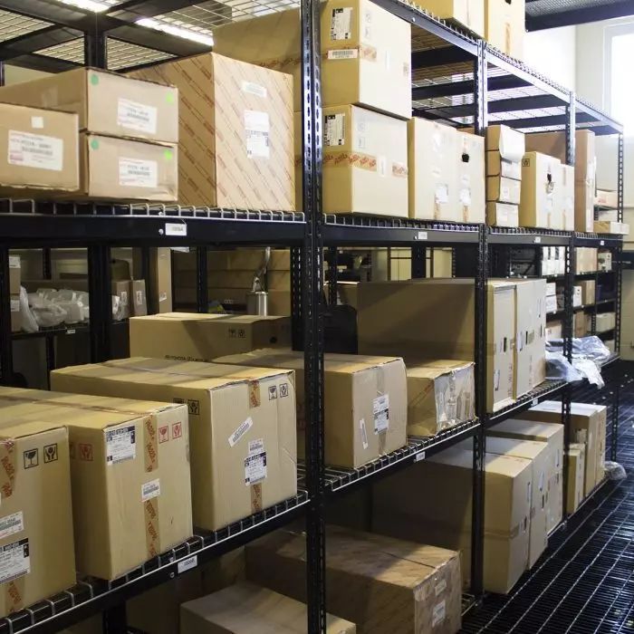 A warehouse filled with lots of boxes including one that says ' a ' on it