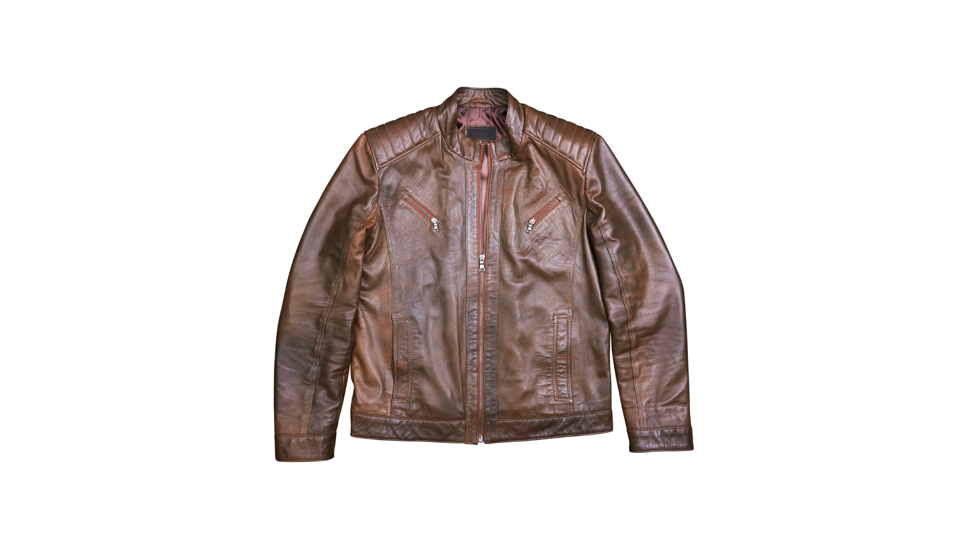 A brown, distressed-finish leather jacket with a front zipper and quilted shoulder panels against a white background.