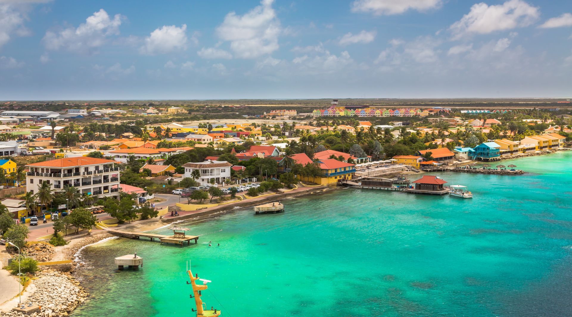An aerial view of a small town in the middle of the ocean.