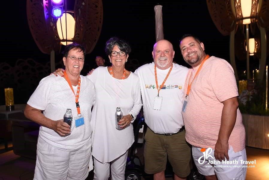 A group of people are posing for a picture together.