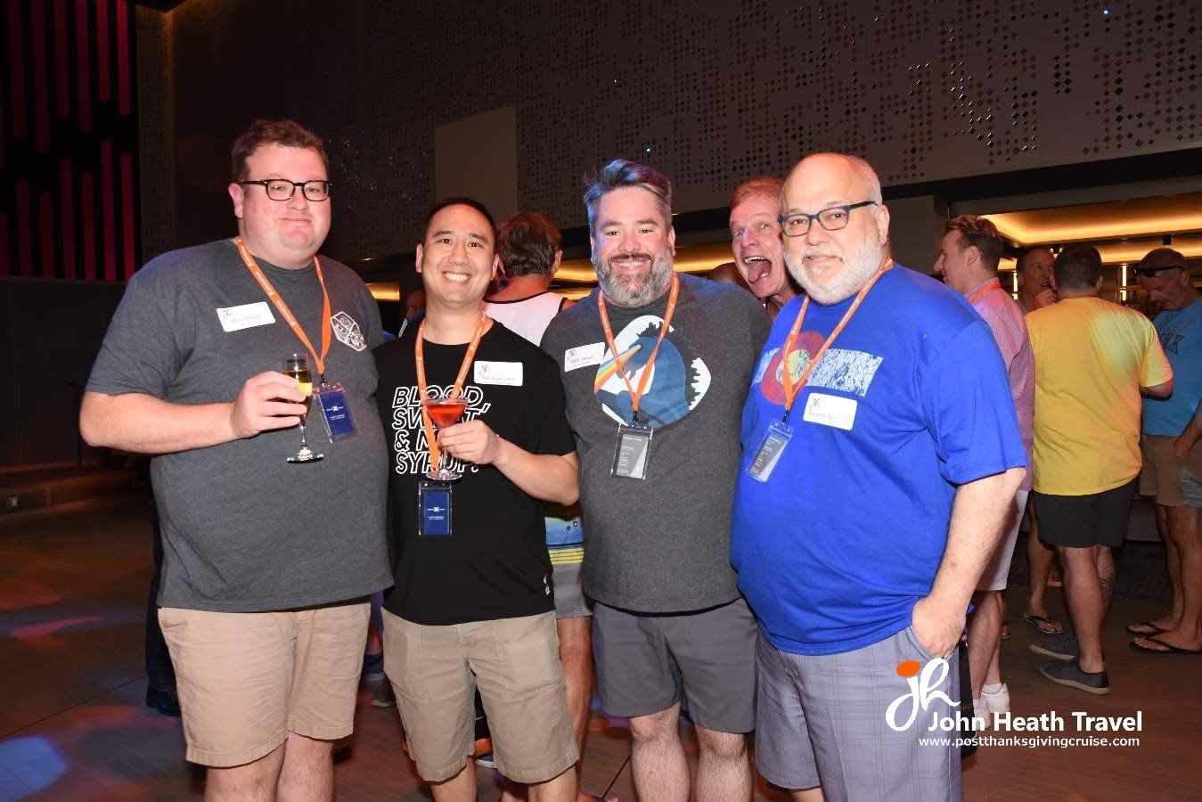 A group of men are posing for a picture at a party.