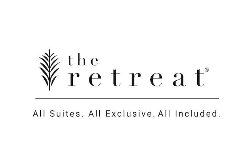 The retreat logo is black and white and says all suites , all exclusive , all included.