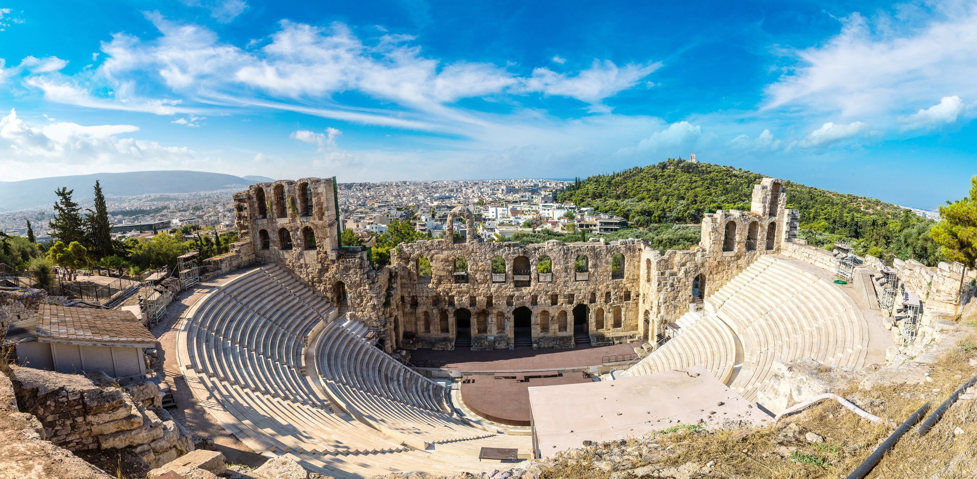 A panoramic view of an ancient amphitheater in athens , greece.