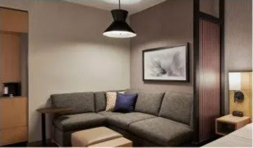 The Hyatt Place room's sofa sleeper sitting area.