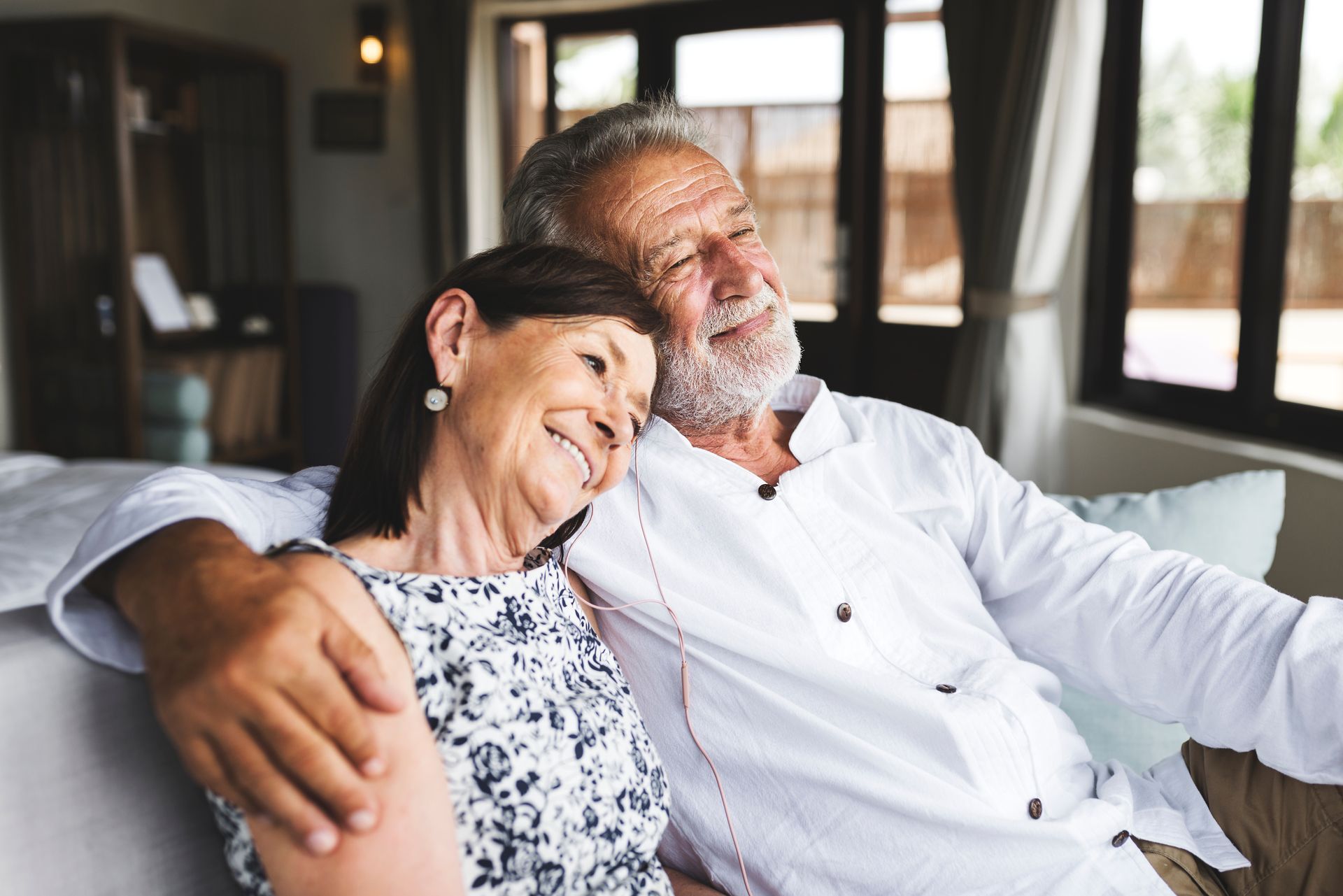 Mature couple enjoying time together at a hotel.