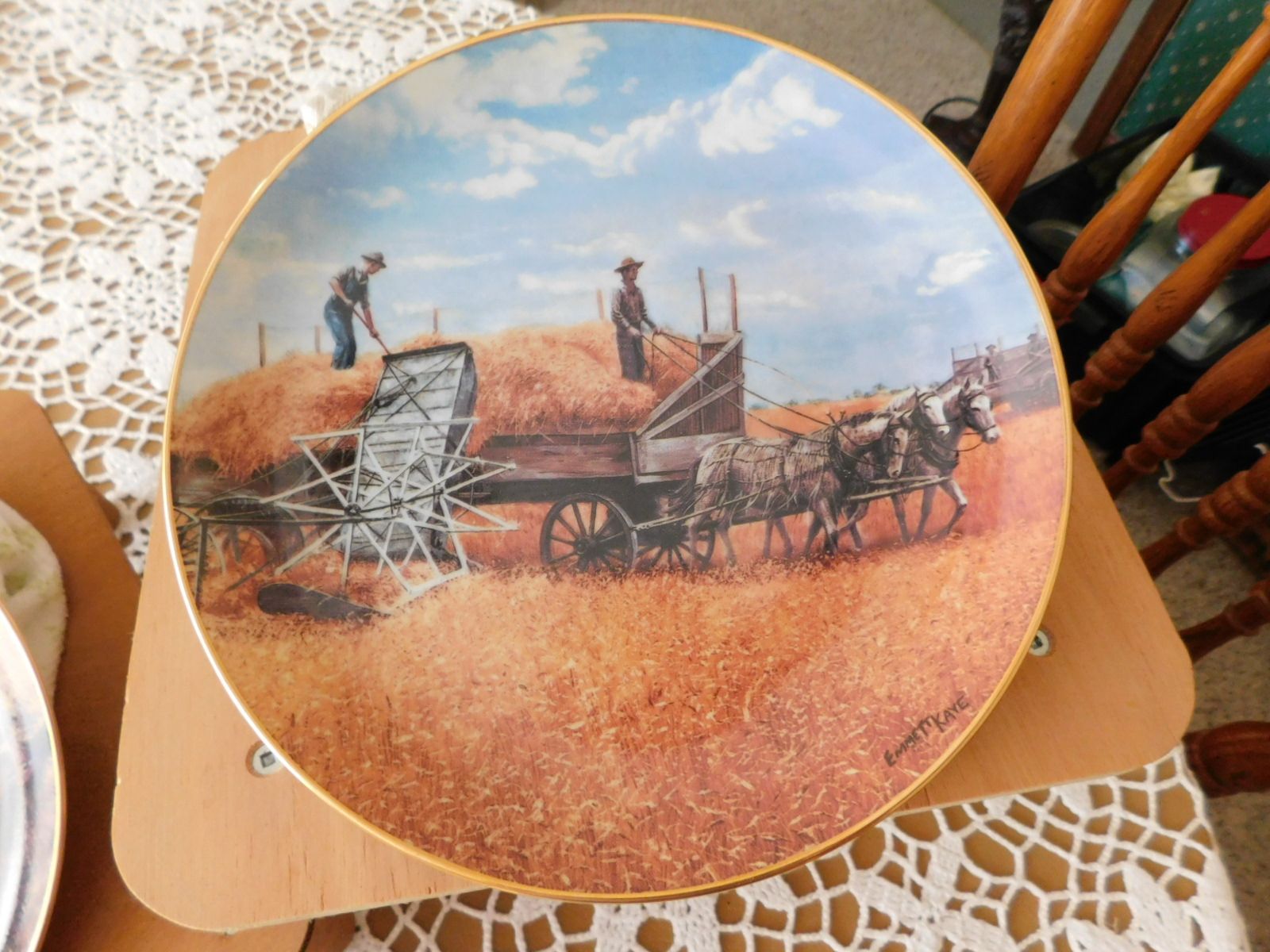A plate with a horse drawn carriage on it