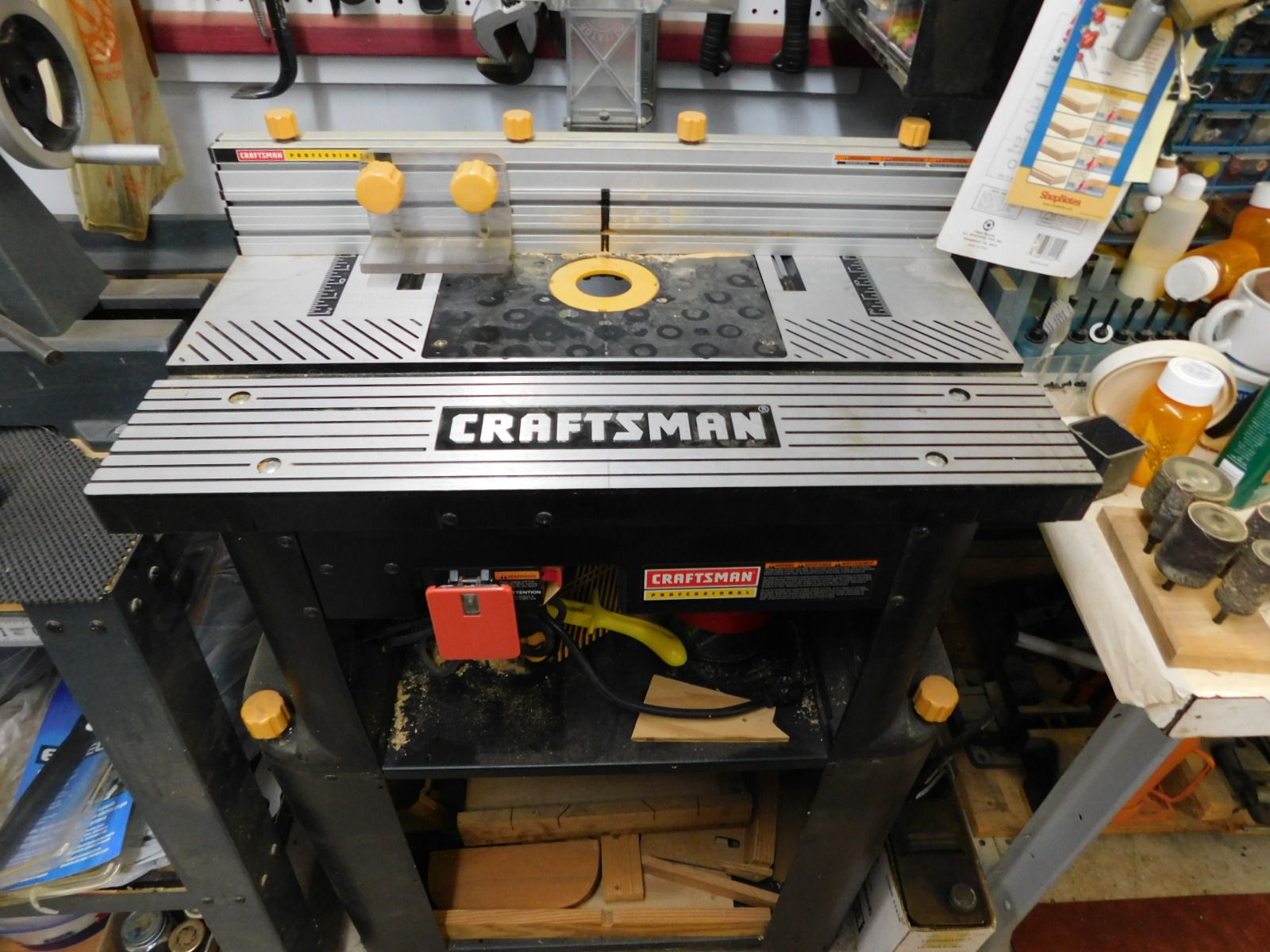 A craftsman router is sitting on top of a table