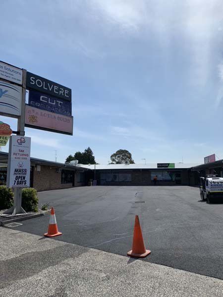 motel parking lot with new asphalt