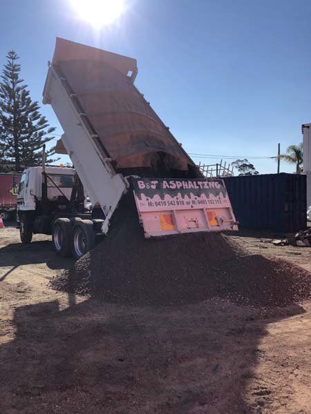 truck delivering asphalt