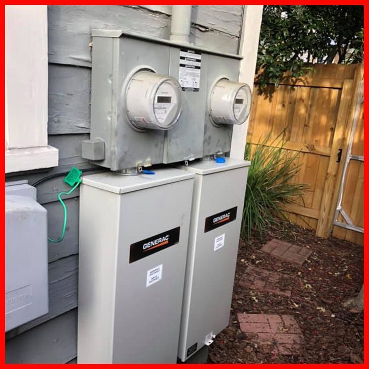 Electrical meters atop two gray Generac power generator boxes.