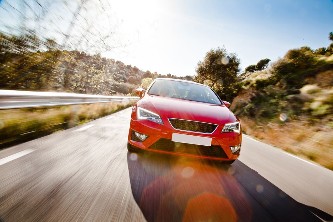 Car On A Road Full Of Dangerous