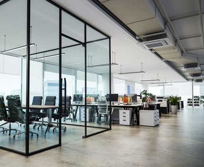 White color theme modern style office with exposed concrete floor and a lot of plant