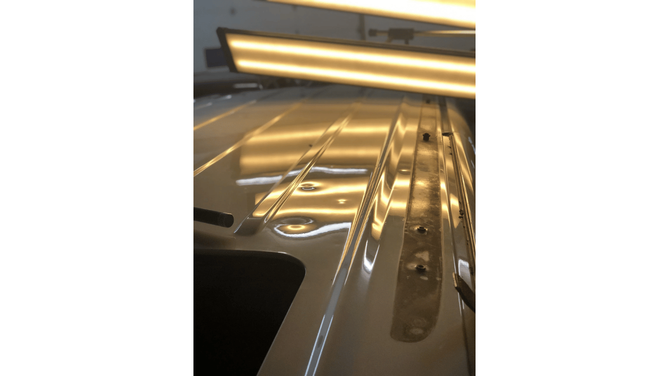 A close up of a car with a light on it.