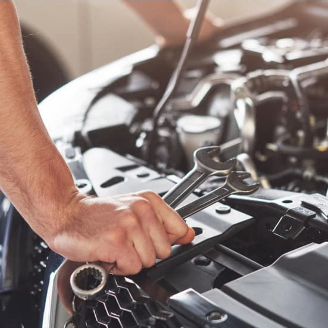 Hand Holding A Wrench — Pinole, CA — Letcher Bros Auto Repair