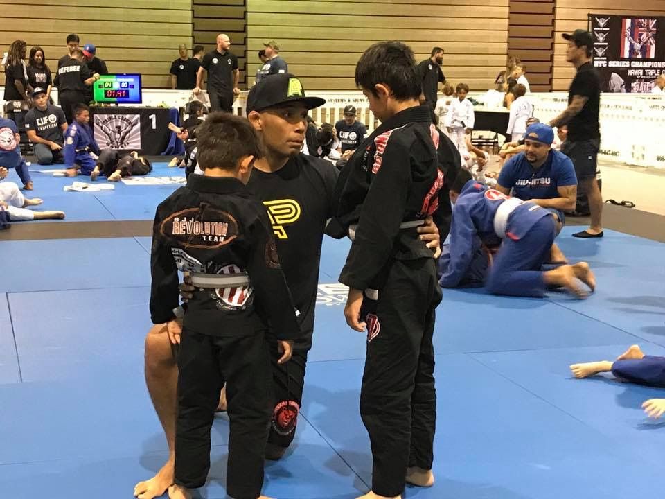 Teens practicing Brazilian Jiu-Jitsu drills at Sugoi Submission in Corpus Christi, Texas, building confidence and control