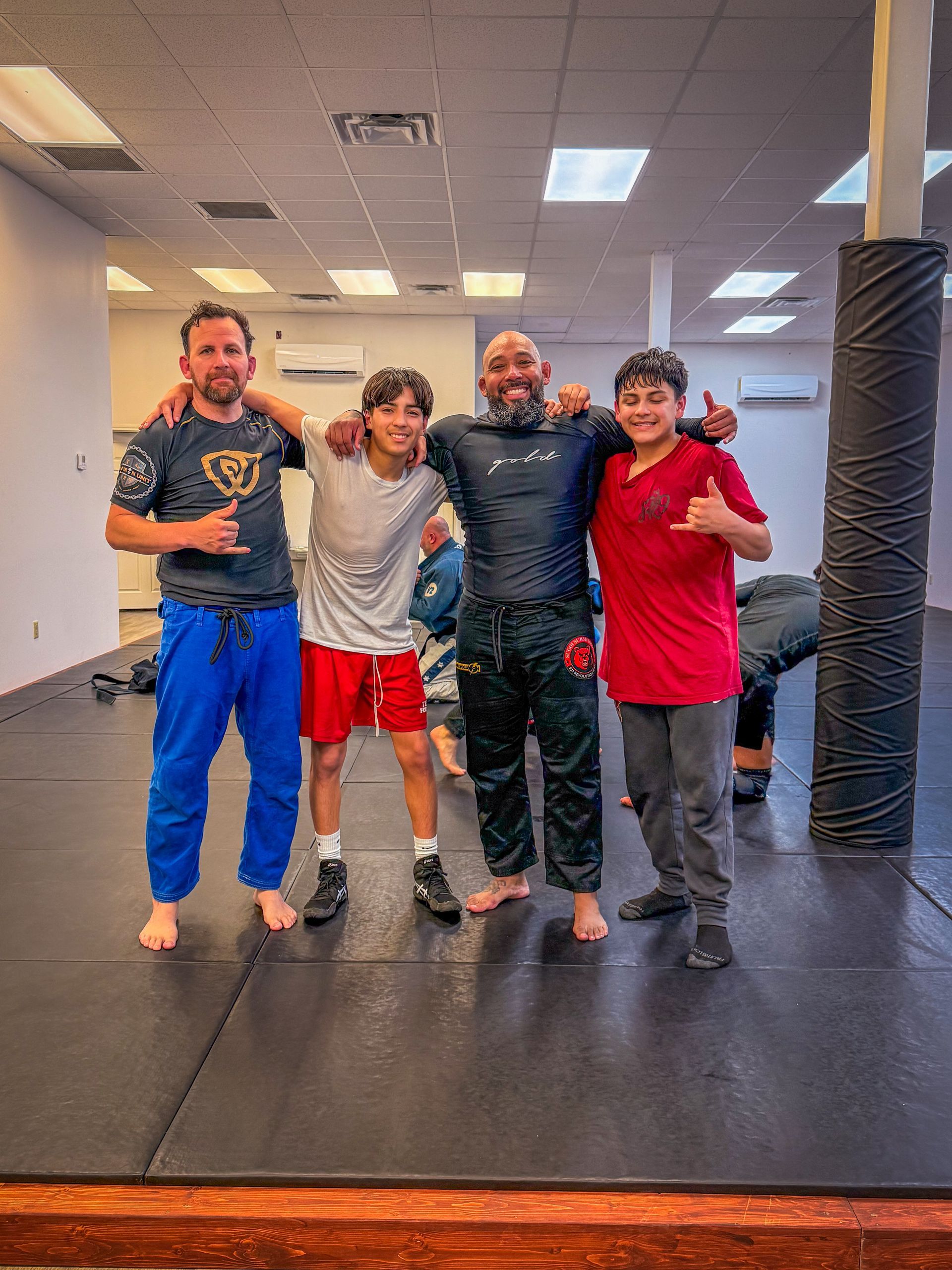 Adults drilling Brazilian Jiu-Jitsu at Sugoi Submission in Corpus Christi, Texas, building trust.