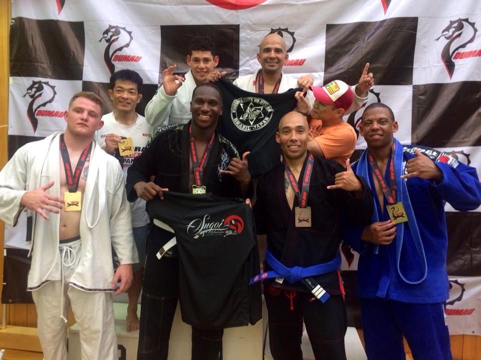 Adults training Brazilian Jiu-Jitsu at Sugoi Submission in Corpus Christi, TX, building fitness.