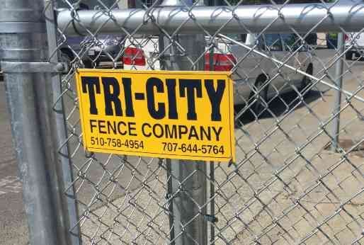 A Chain Link Fence with a Tri-city Fence Company Sign on it. | Vallejo, CA | Tri-City Fence Company