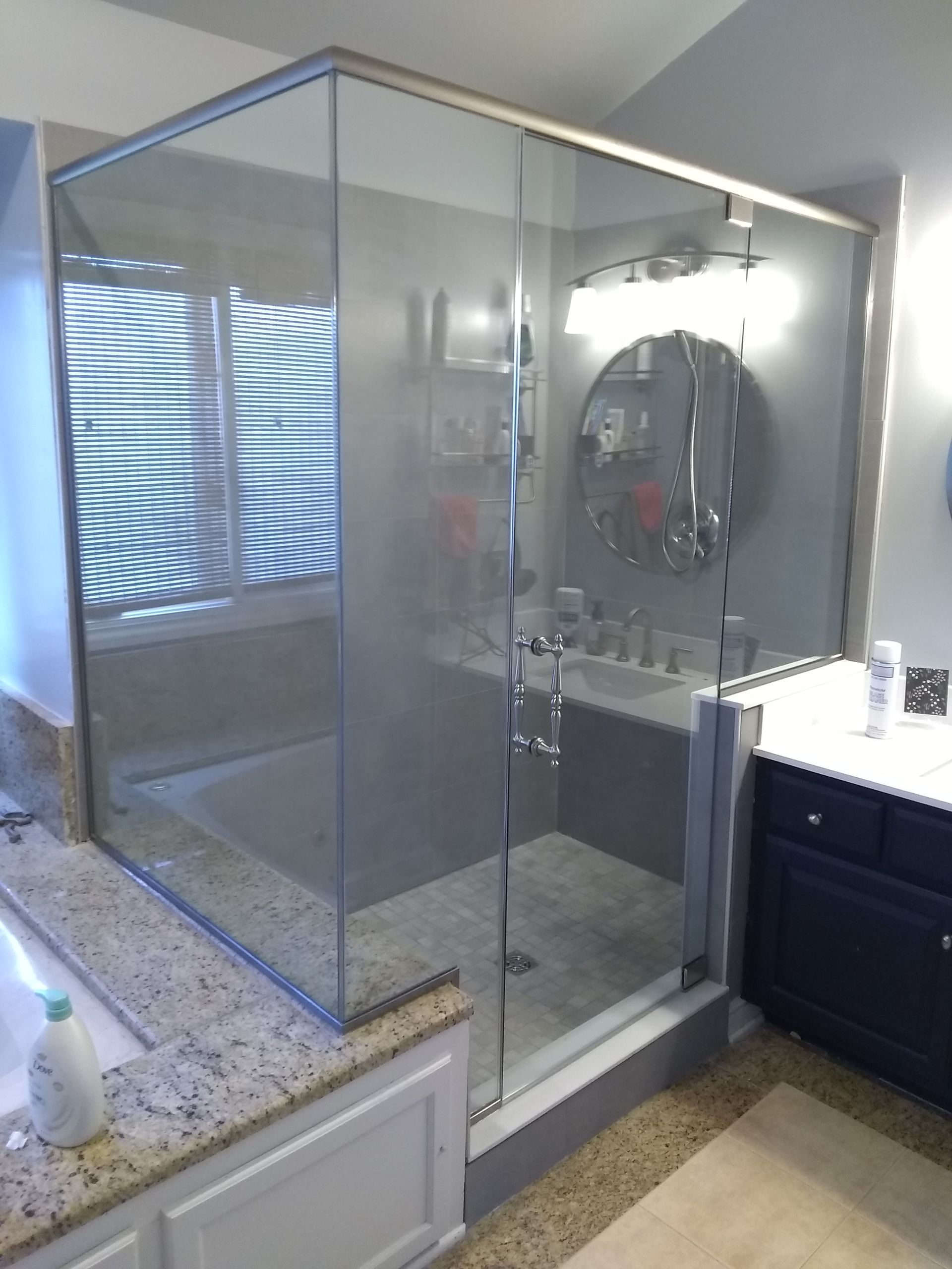 A bathroom with a walk-in shower.