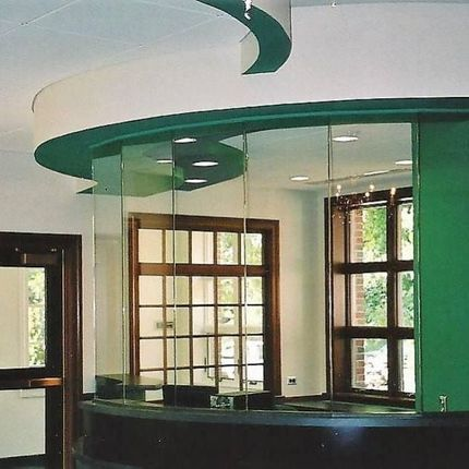 A room with a green wall and a green ceiling.