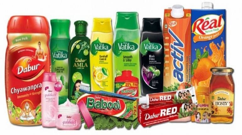 Assorted colorful fruit juice and beverage cartons and bottles arranged in a product display