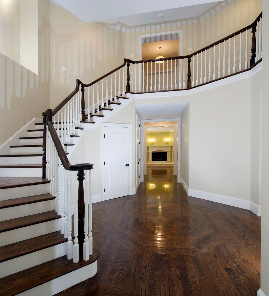 A staircase leading up to the second floor of a house