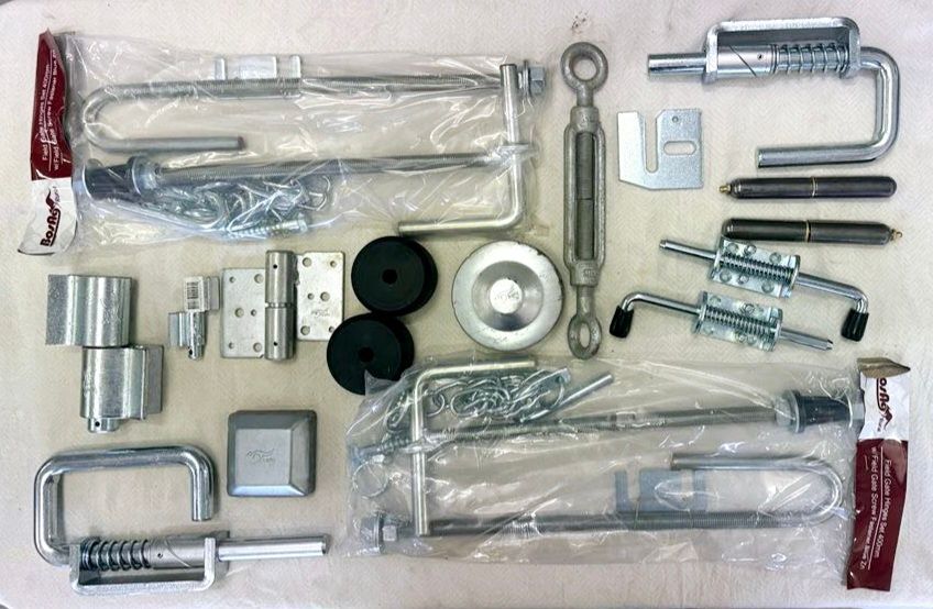 A bunch of metal parts are laying on a table