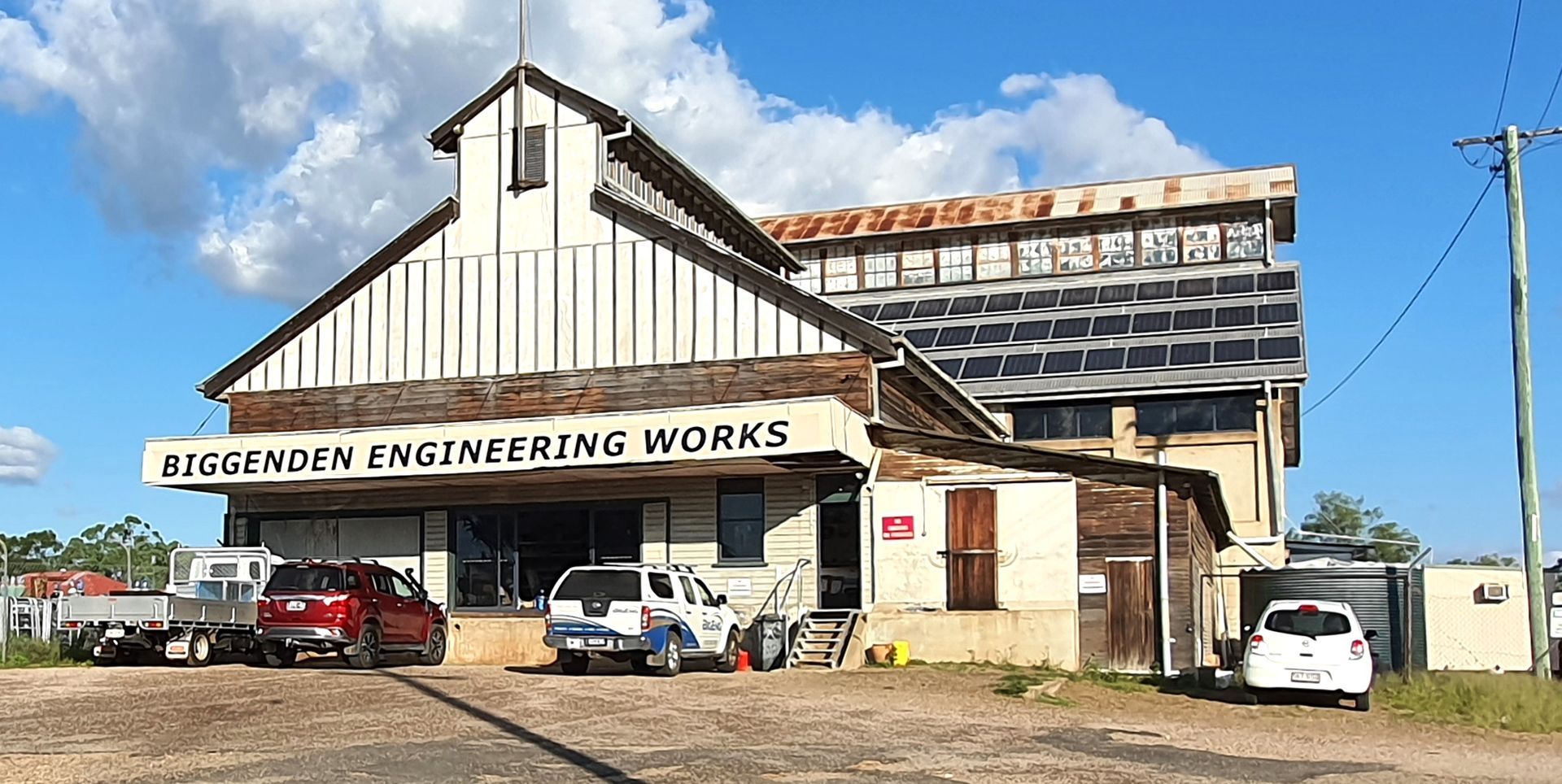 A large building with a sign that says showroom engineering works