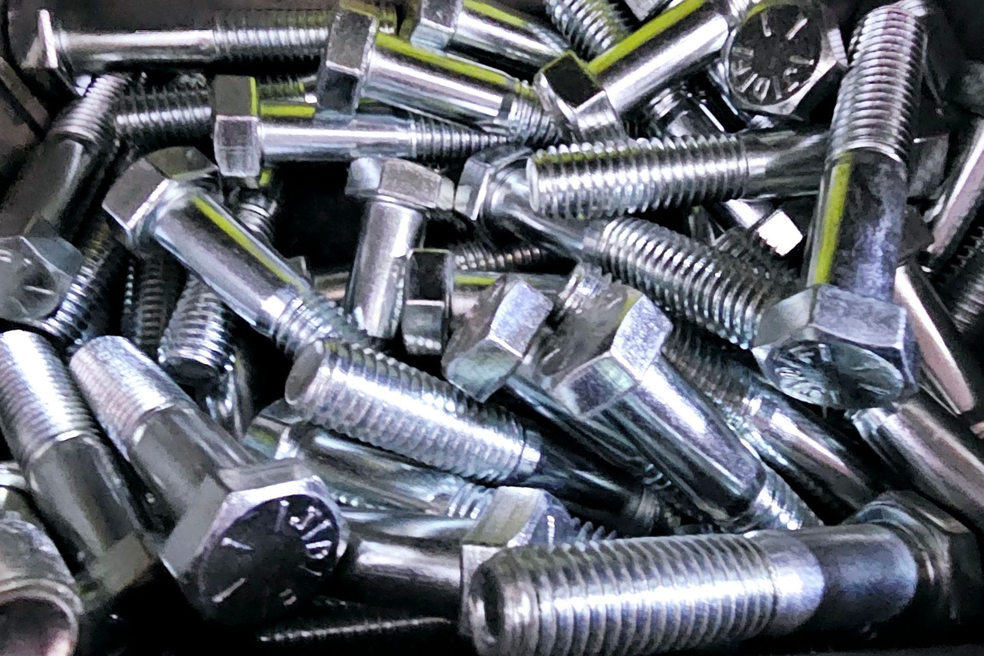 A pile of nuts and bolts with the word jia on them