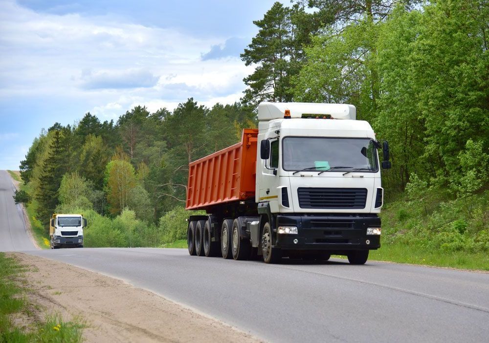 Two Trucks on the Road — Ceely's Heavy Vehicle Driver Training & Assessments In Deniliquin, NSW