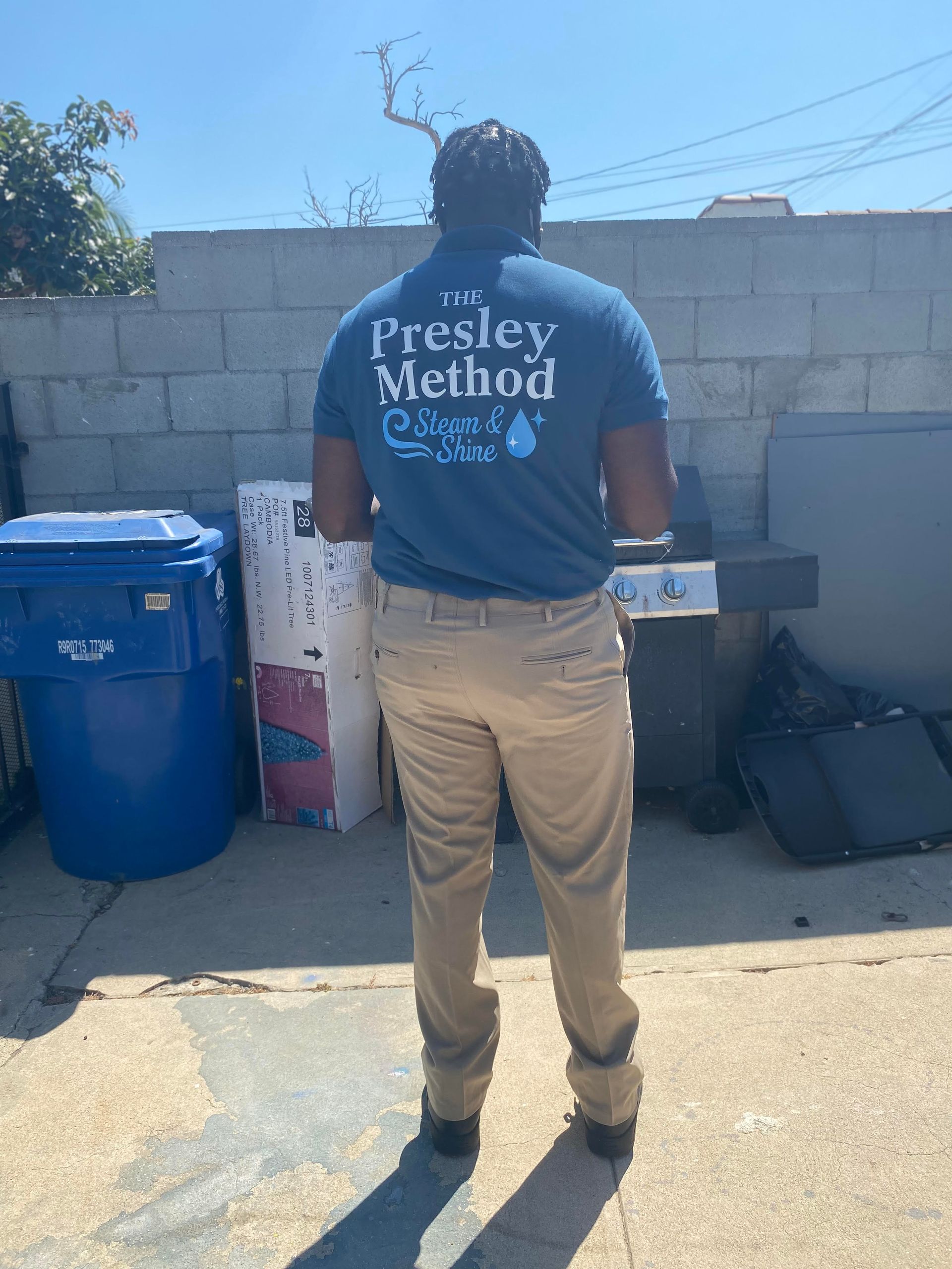 Man in khaki pants and blue shirt with