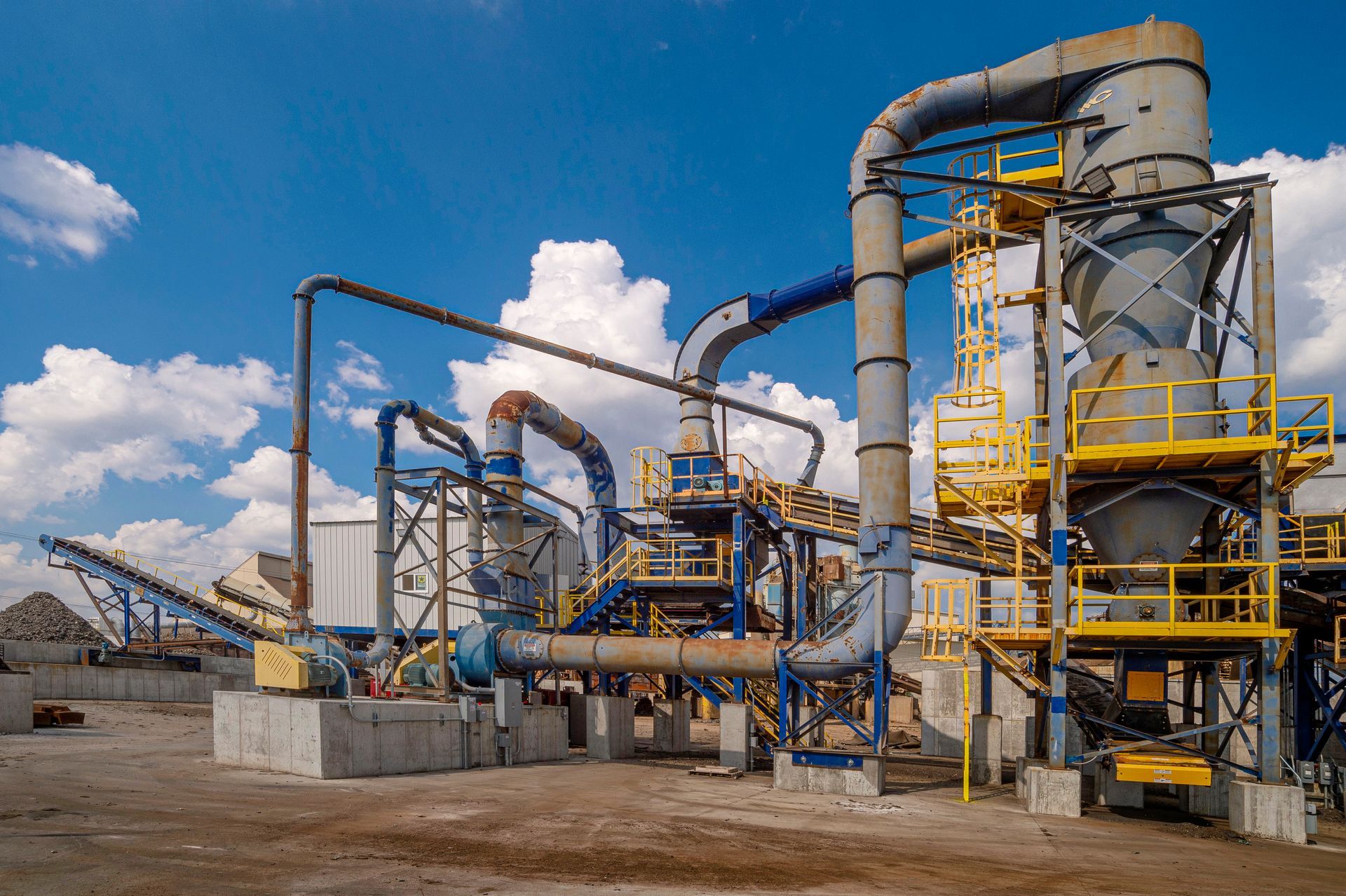A large industrial plant with a lot of pipes and machinery.