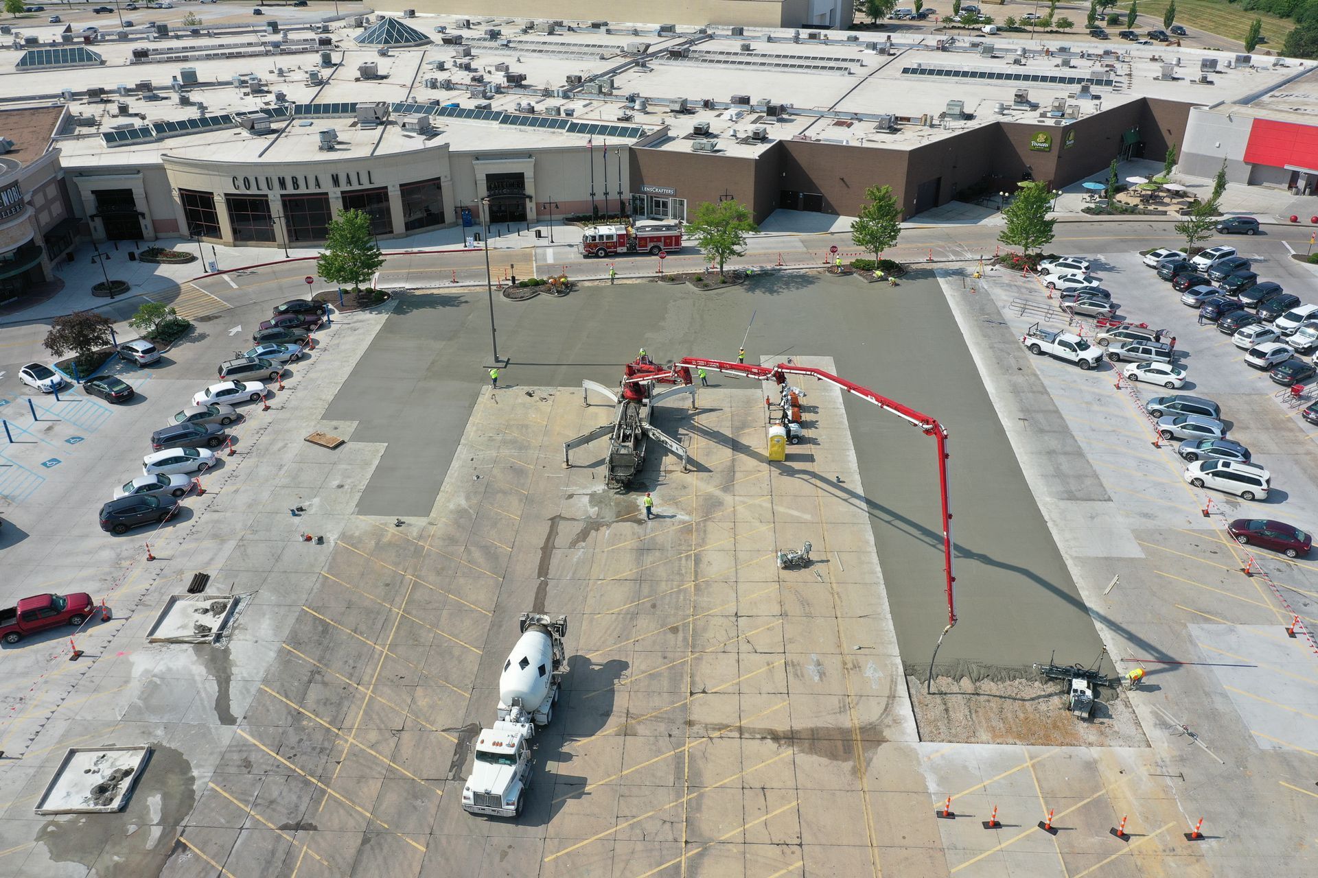 An aerial view of a parking lot under construction