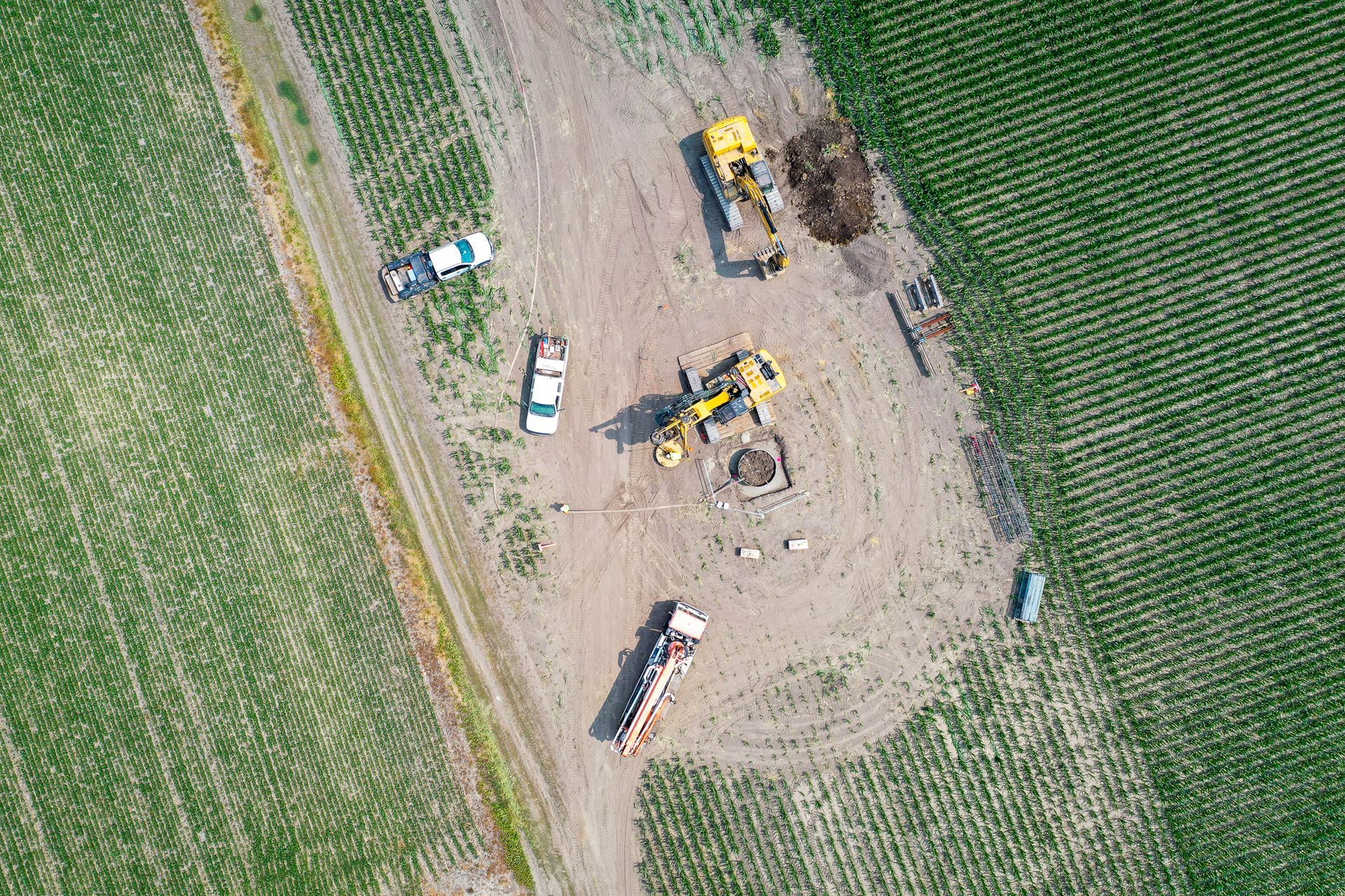 An aerial view of a construction site in a field.