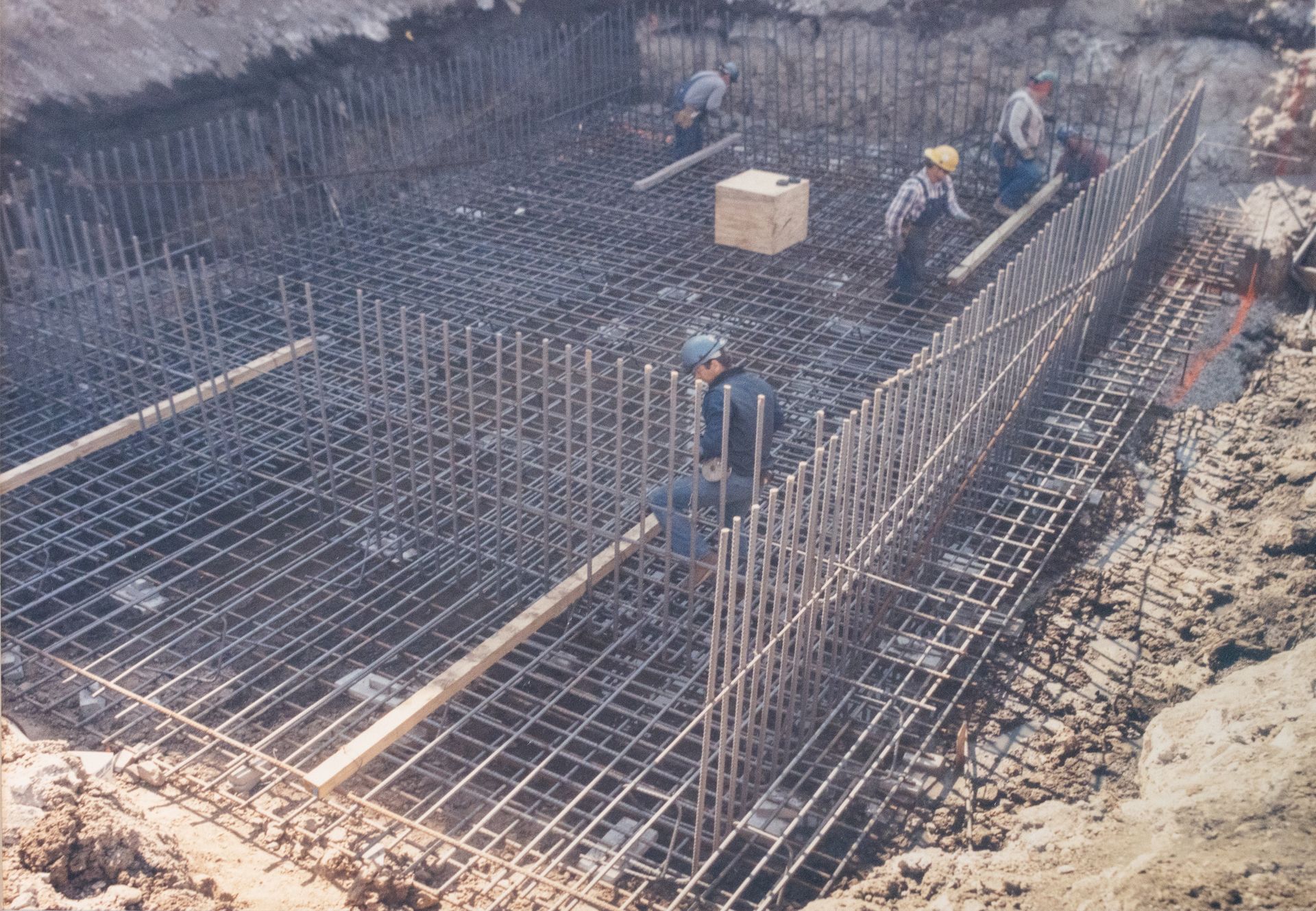 A group of men are working on a construction site