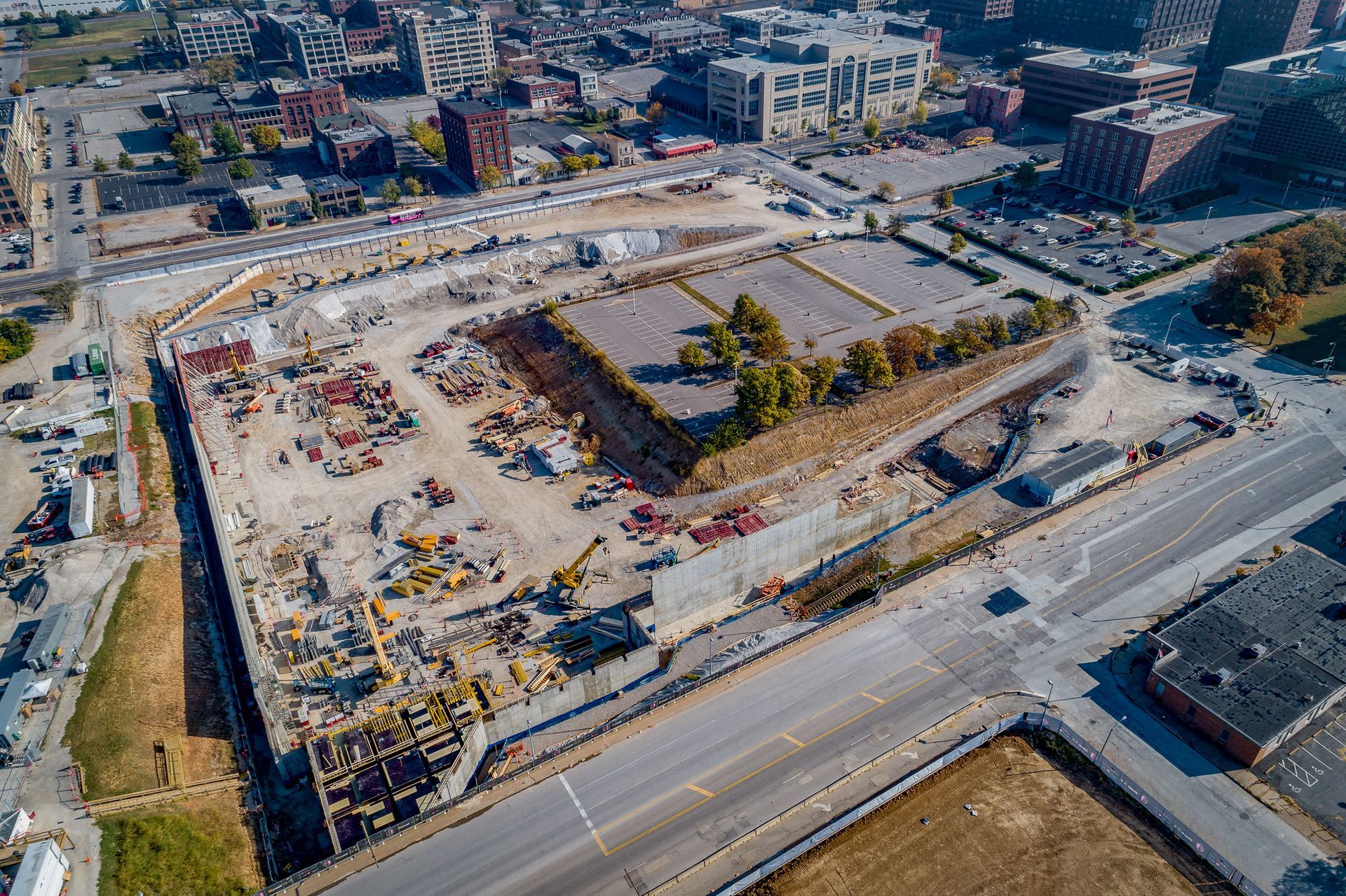 An aerial view of a large construction site in a city.