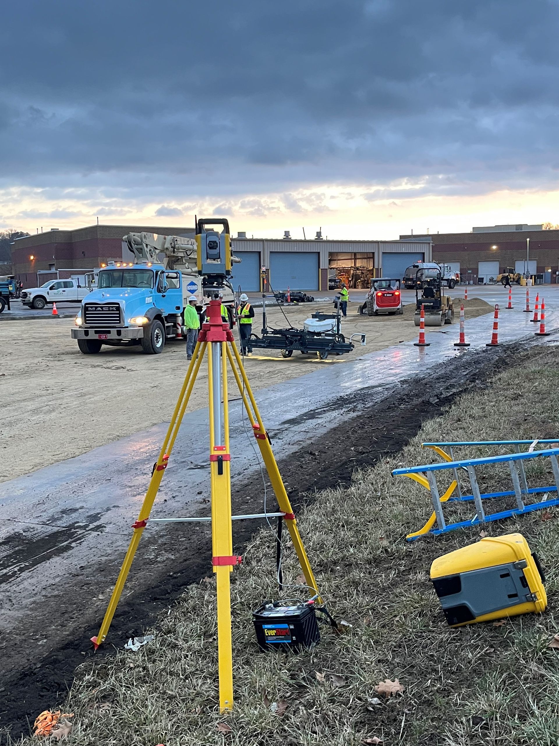 A group of construction workers are working on a construction site.