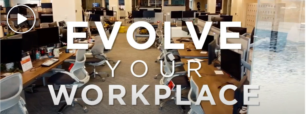 A picture of an office with the words `` evolve your workplace '' written on it.