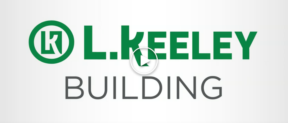 A green and white logo for l. keely building